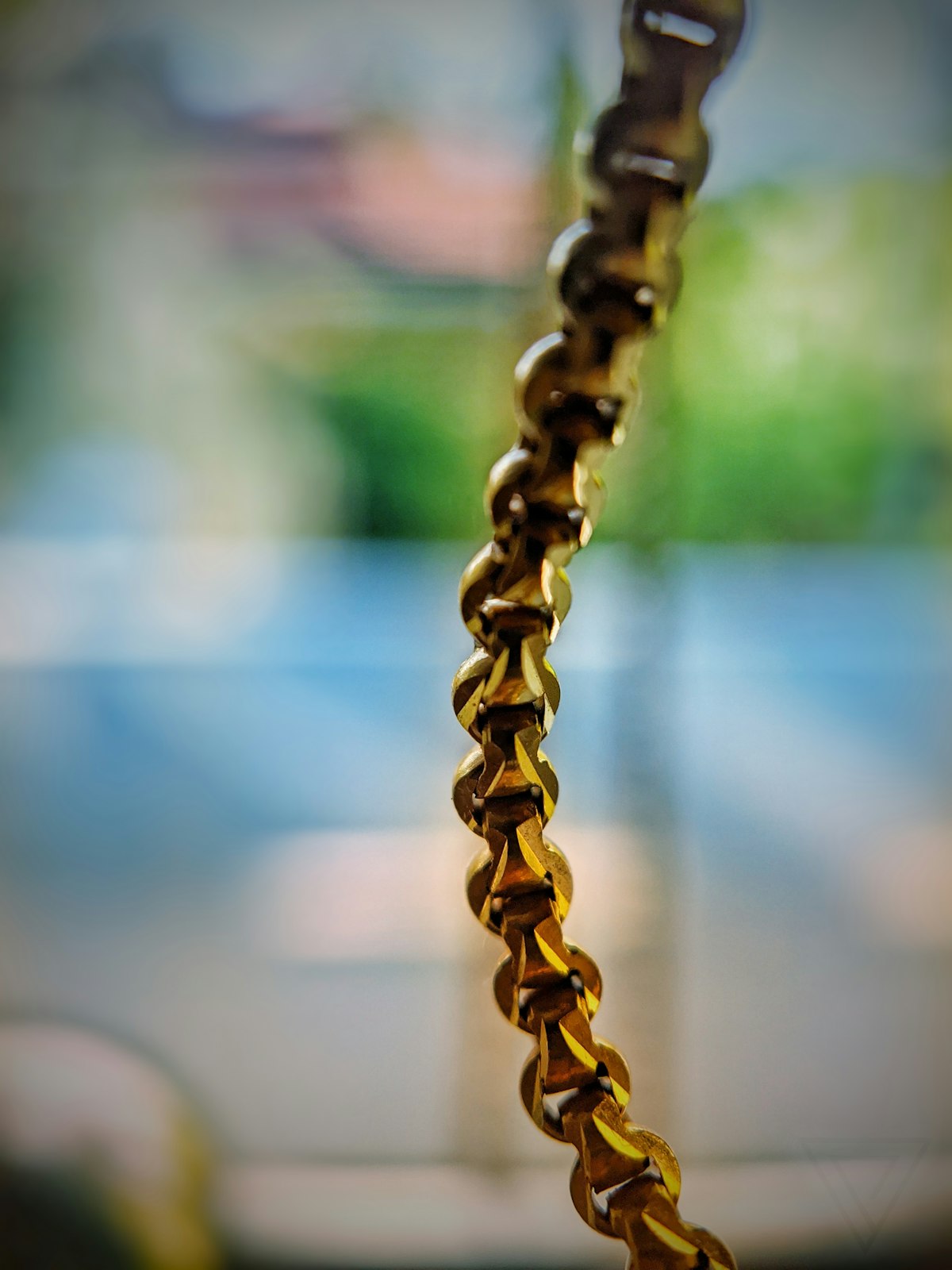 Macro close-up of gold chain links
